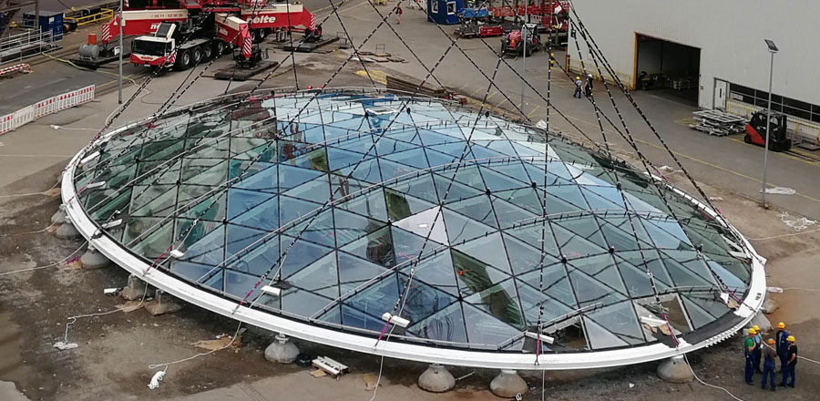 Self-supporting glass roof dome by FRENER &amp; REIFER with 350 sheets of triangular double-layer glazing for Meyer Werft