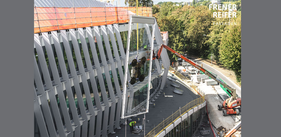 inclined and twisted three-storey bespoke double facade