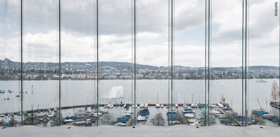 FRENER &amp; REIFER inside the undulating glass facade